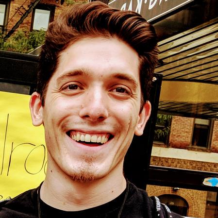 Eli Sobylak's headshot